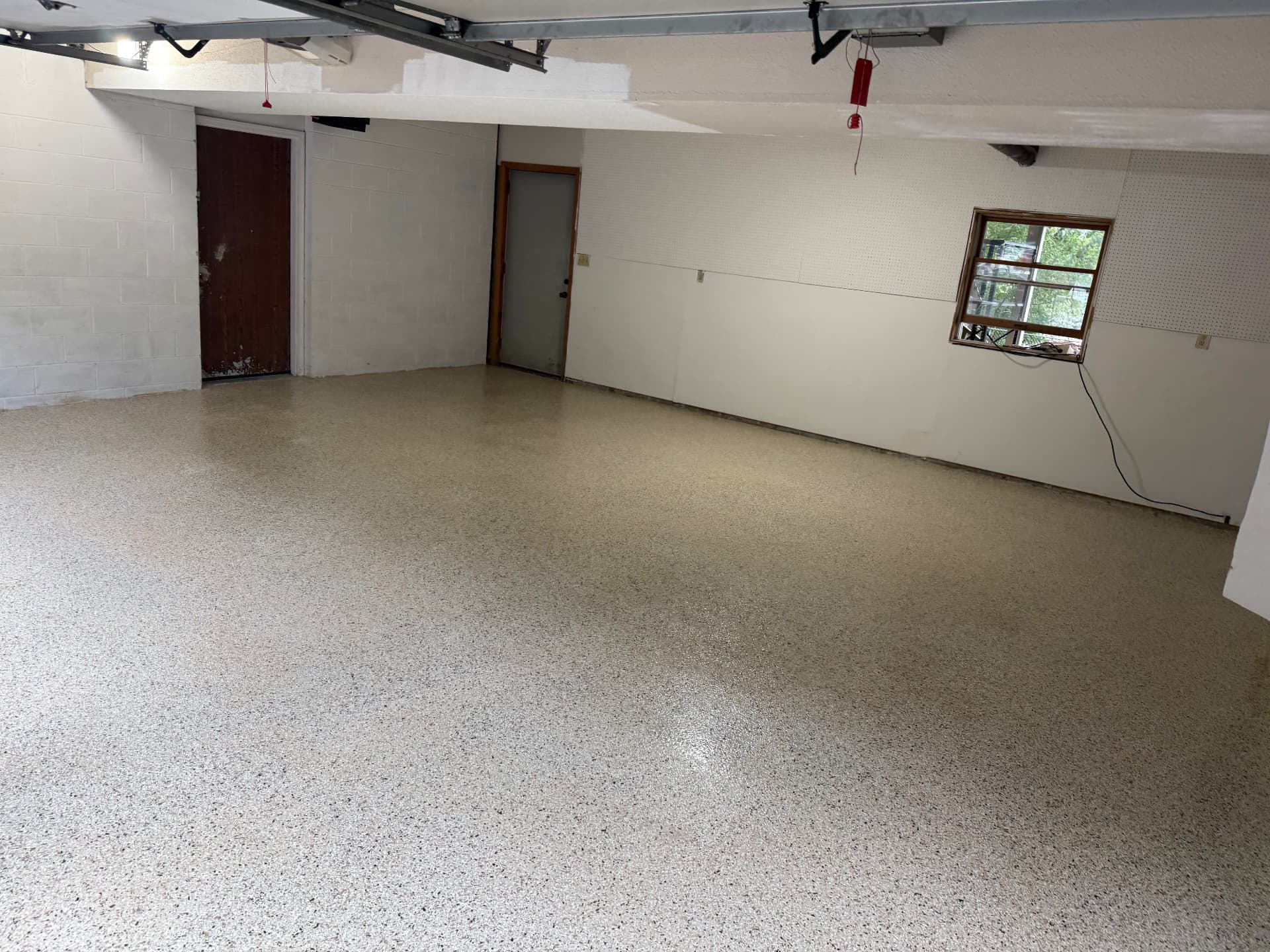 Finished floor: Flake Garage, Start to Finish — Finished flake garage floor with glossy polyaspartic topcoat